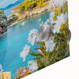 Close-up of a vibrant acrylic glass wall art piece showcasing a serene village landscape, featuring lush greenery and quaint cottages, perfect for home decor.