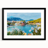 Framed wall art collection showcasing serene landscapes and quaint villages, featuring a sleek black frame and white mat, ideal for home decor enhancement.