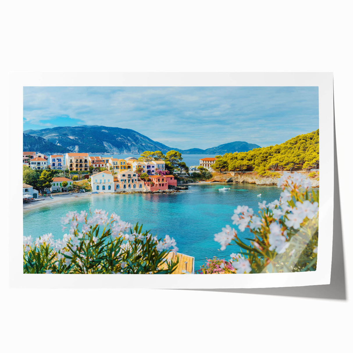 Rolled print of a vibrant landscape village design featuring colorful houses and lush greenery, ideal for home decor, presented in a protective cardboard tube.