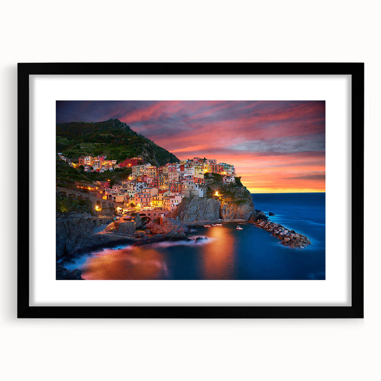 Framed wall art collection showcasing a serene village landscape design, featuring a black frame and mat, perfect for home decor and artistic enhancement.