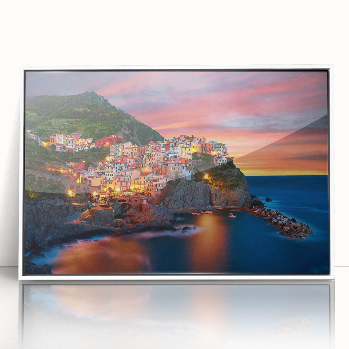 Framed acrylic wall art collection showcasing a serene village landscape design, featuring vibrant colors and intricate details, perfect for home decor.