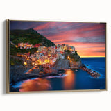 Framed canvas wall art showcasing a picturesque village landscape design with gold accents, ideal for home decor, adding a touch of elegance and warmth.