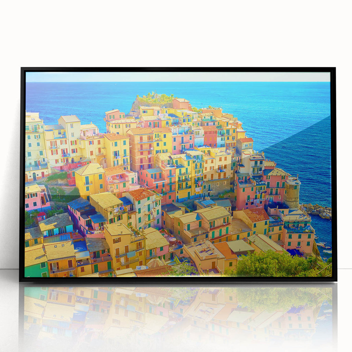 Framed acrylic wall art showcasing a vibrant landscape of a village, featuring lush greenery and colorful homes, designed to enhance modern decor.