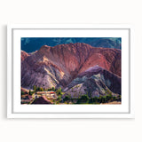 Framed white wall art display showcasing a vibrant landscape village design with intricate details, perfect for home decor enhancement and artistic appeal.