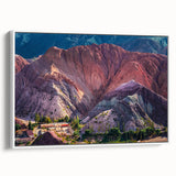 Framed canvas wall art showcasing a serene village landscape design with soft pastel colors, displayed from a side view against a white background, ideal for home decor.