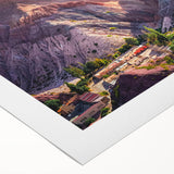 Rolled canvas showcasing a vibrant landscape village design, featuring lush greenery and colorful homes, ideal for enhancing modern interior decor.