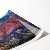 Vibrant rolled print of a serene landscape village scene featuring lush greenery and quaint houses, ideal for home decor or wall art collections.