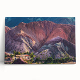Stretched canvas wall art collection showcasing vibrant landscapes and charming villages, featuring rich colors and detailed designs, perfect for home decor.