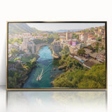 Framed wall art piece showcasing a vibrant village landscape design with gold accents, perfect for enhancing home decor and adding a touch of elegance.