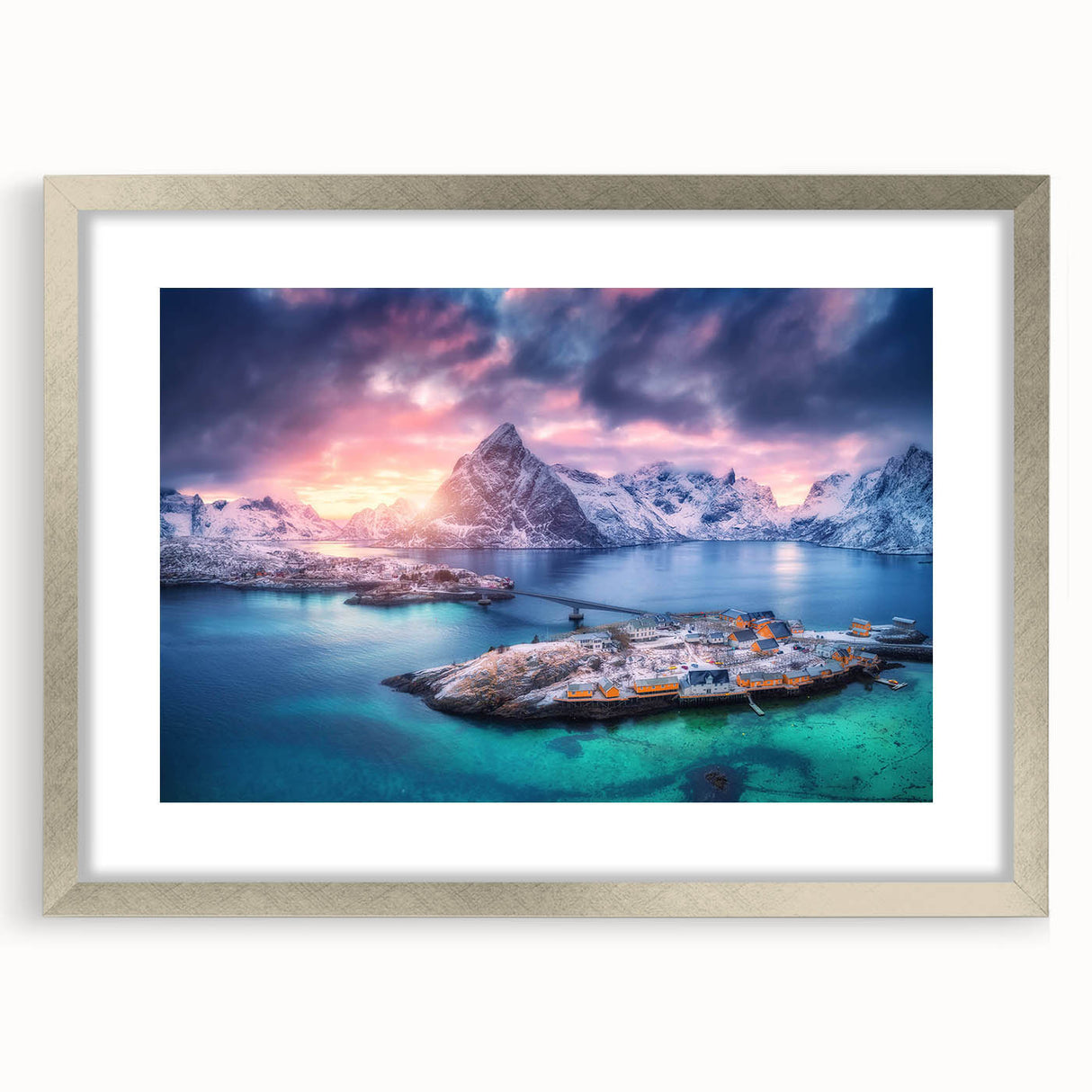 Framed wall art collection showcasing a picturesque village landscape in soft pastel colors, featuring a sleek silver frame with matting, perfect for home decor.