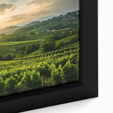 Framed canvas wall art showcasing a vibrant vineyard landscape design, featuring lush green vines and rolling hills under a clear blue sky, perfect for home decoration.