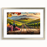 Framed wall art depicting a serene vineyard landscape with lush green vines and rolling hills, featuring a silver frame and mat, ideal for home decor.