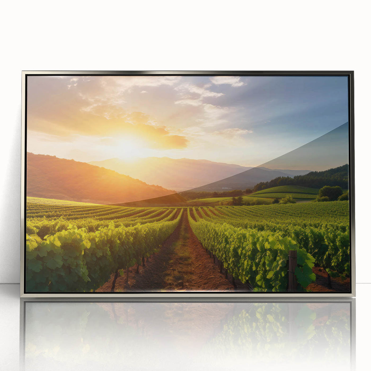 Framed acrylic wall art featuring a picturesque vineyard landscape design with vibrant green grapevines and rolling hills, presented in a sleek silver frame. Ideal for enhancing home decor or wine-themed spaces.