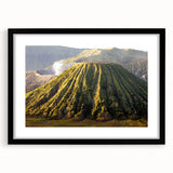 Framed wall art featuring a vibrant volcano landscape design, set in a sleek black frame with a mat, ideal for enhancing home decor with natural beauty.