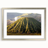 Framed wall art featuring a stunning landscape design of a volcano, showcased in a sleek silver frame with a mat, perfect for home decor enthusiasts.