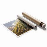 Vibrant rolled print of a volcanic landscape design showcasing fiery reds and deep blacks, ideal for home decor or art collections, presented in protective packaging.