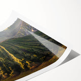 Vibrant rolled print of abstract volcano landscape wall art, showcasing bold colors and dynamic textures, ideal for home decor or office enhancement.