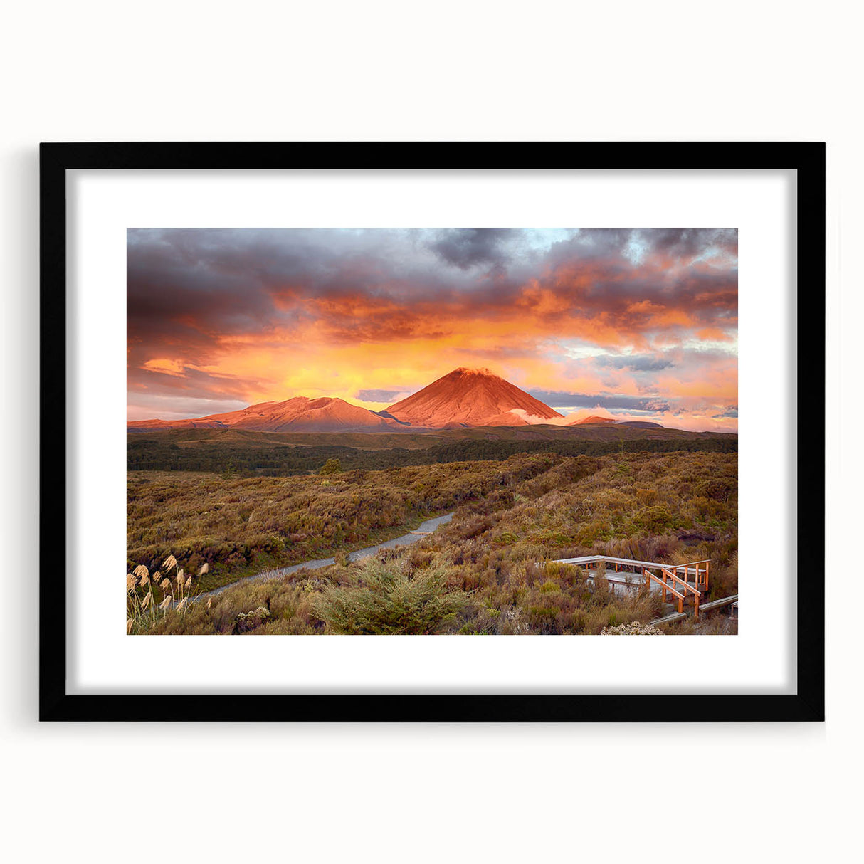 Framed black wall art featuring a vibrant volcano landscape design, showcasing rich colors and intricate details, perfect for modern home decor.