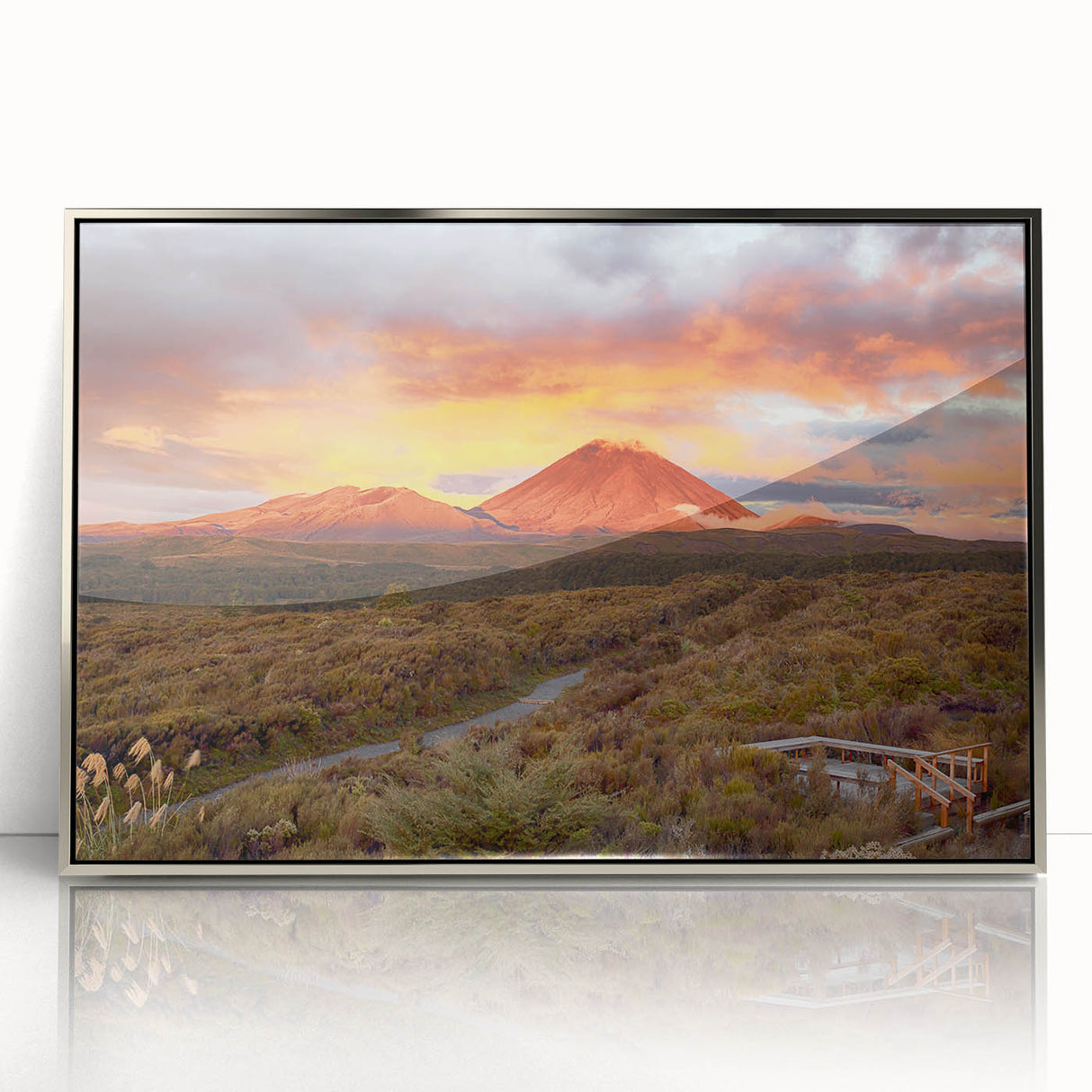 Framed acrylic wall art depicting a vibrant volcano landscape design with silver accents, showcasing bold colors and intricate details for modern decor. Perfect for adding a striking focal point to any room.