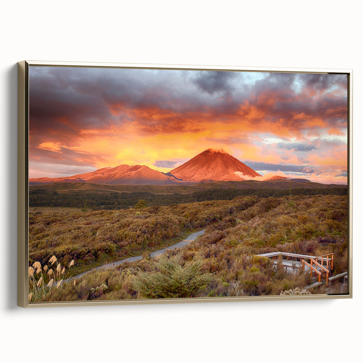 Framed canvas wall art showcasing a stunning volcanic landscape design in rich gold tones, set against a neutral background, ideal for modern home decor.
