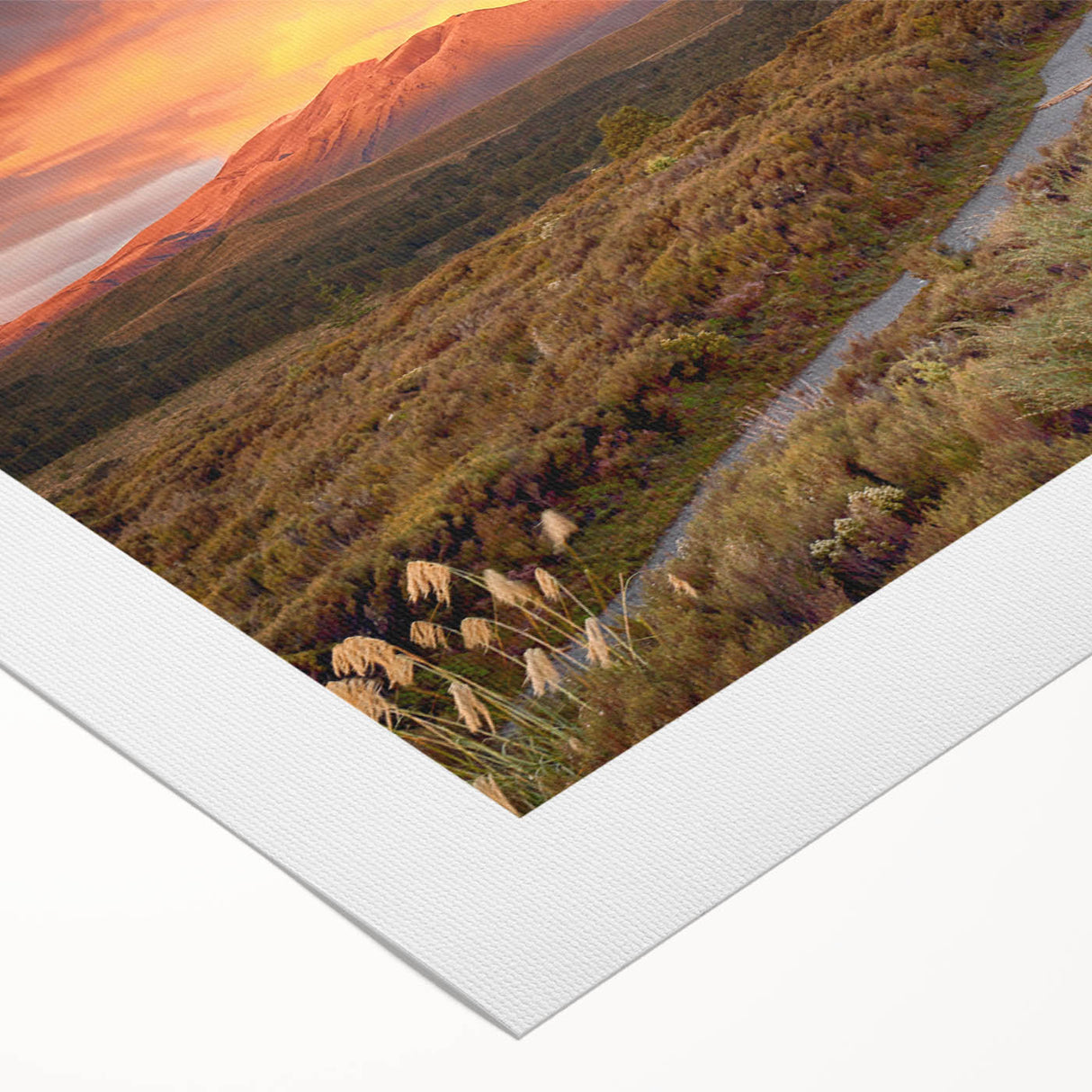 Vibrant rolled canvas wall art showcasing a dramatic volcano landscape design, perfect for home decor, featuring rich colors and a textured finish.