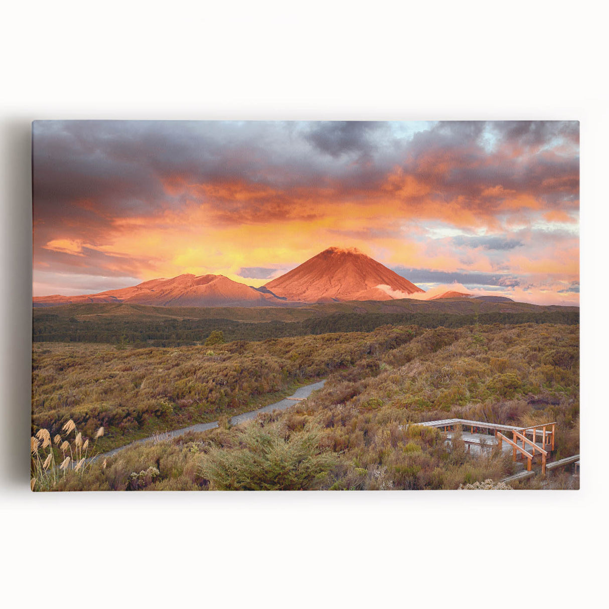 Stretched canvas wall art depicting a vibrant volcano landscape with rich colors and dynamic textures, ideal for home decor or office ambiance.