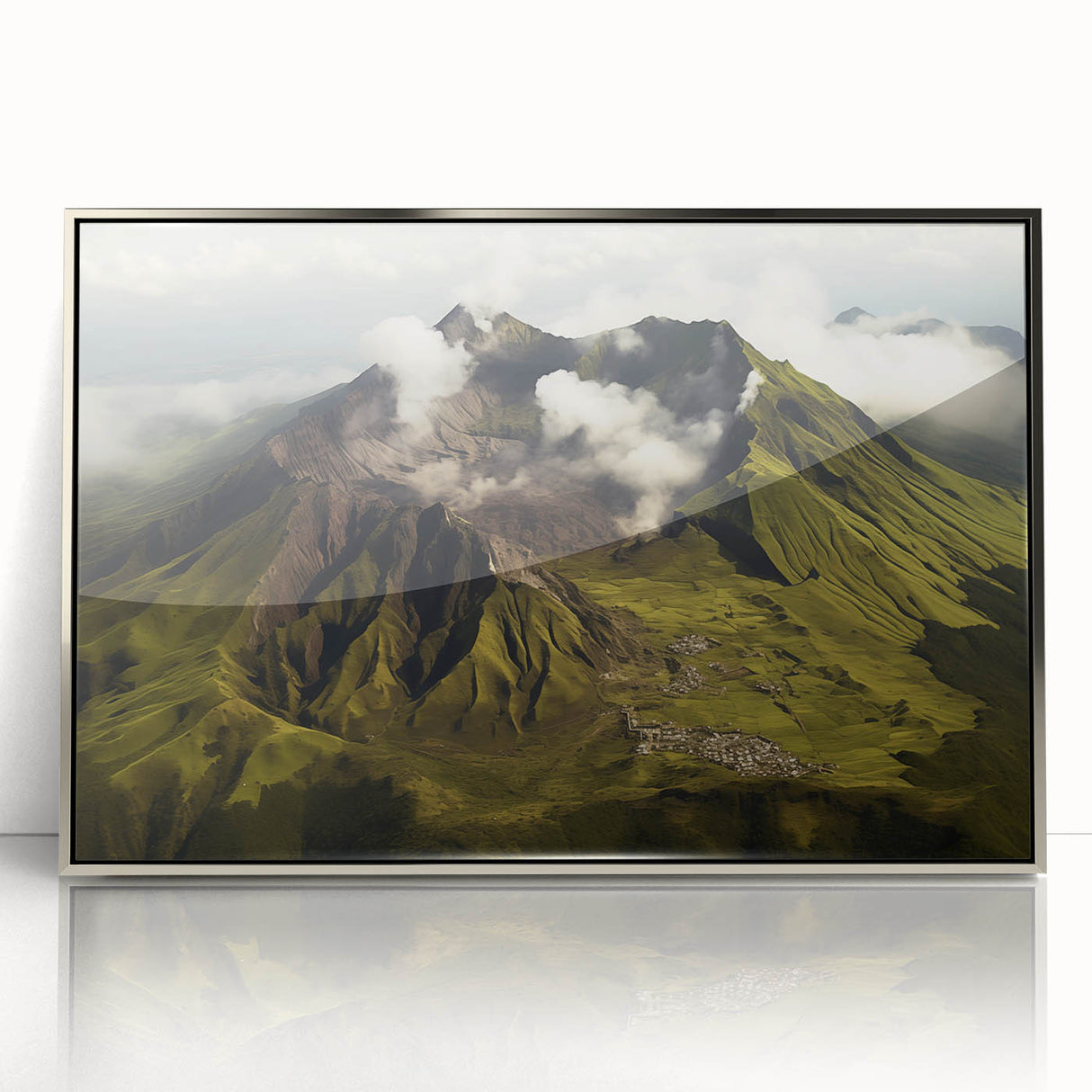 Framed acrylic wall art depicting a vibrant volcanic landscape with striking orange and red hues, set in a sleek silver frame, perfect for modern decor.