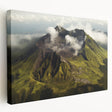 Stretched canvas wall art featuring a vibrant volcano landscape design in rich oranges and blues, perfect for enhancing modern home decor with a striking natural scene.
