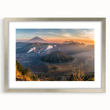 Framed silver mat wall art showcasing a vibrant volcano landscape design, perfect for home decor. Ideal for nature enthusiasts and modern interiors.