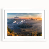 Framed landscape wall art showcasing a vibrant volcano design, featuring a white mat and sleek black frame, perfect for modern home decor. Ideal for art enthusiasts.
