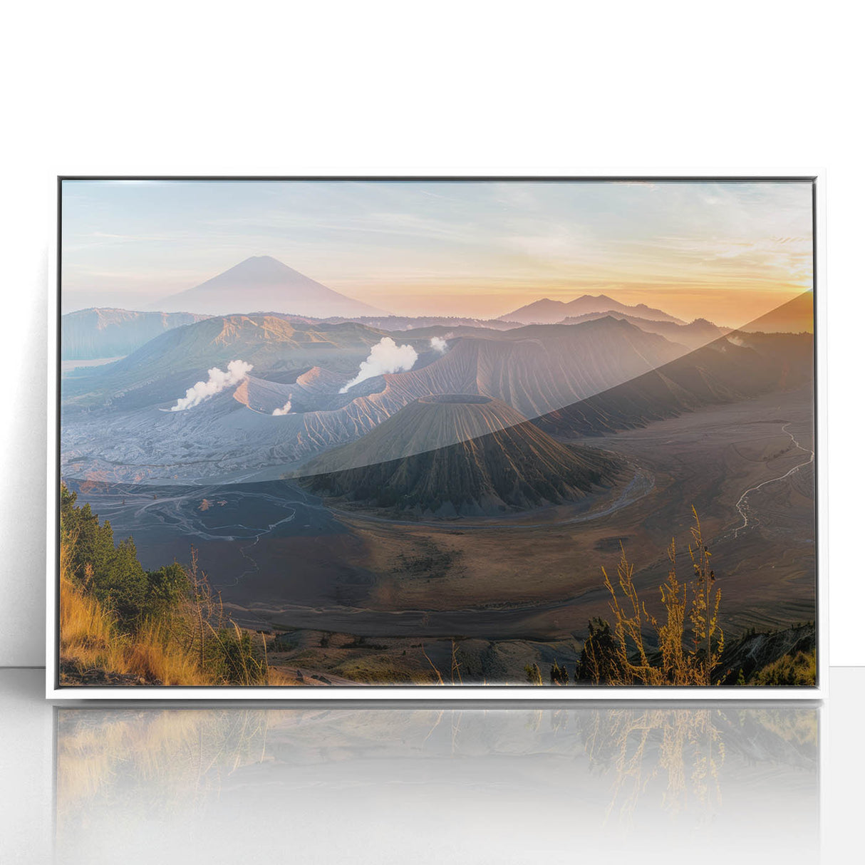 Framed acrylic wall art featuring a vibrant volcano landscape design with bold colors and dramatic contrasts, ideal for modern home decor.