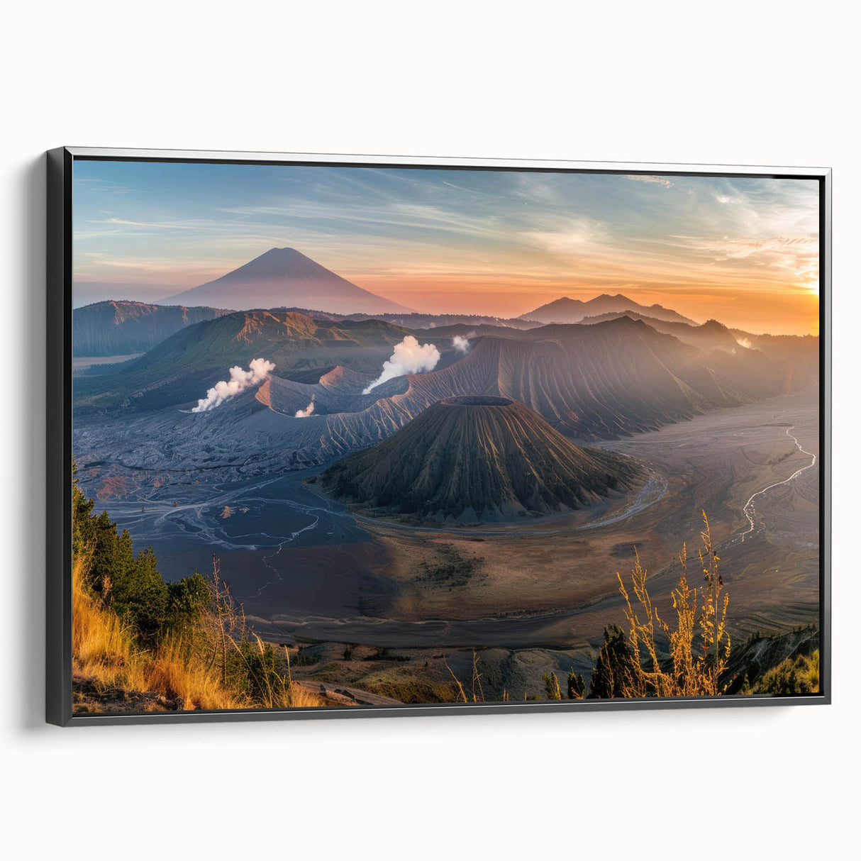 Framed canvas wall art featuring a striking volcano landscape design with vibrant colors and intricate details, displayed from a side view against a neutral backdrop.