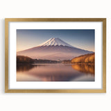 Framed wall art featuring a striking volcanic landscape design, complete with a gold mat and frame. Ideal for adding elegance to home decor.