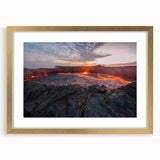 Framed wall art depicting a vibrant volcano landscape design in gold and earth tones, showcasing intricate details and textures, perfect for home decor.