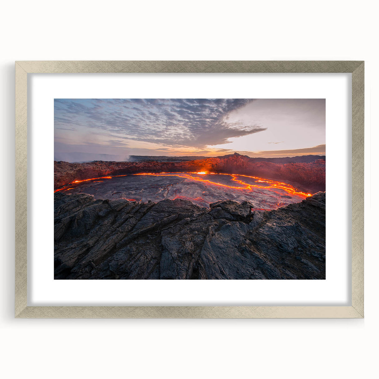 Framed landscape wall art showcasing a vibrant volcano design with a silver mat, ideal for home decor. Perfect for adding a touch of nature elegance to any space.