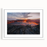 Framed wall art featuring a vibrant volcano landscape design, presented in a sleek white frame with a mat, ideal for home decor and art enthusiasts.