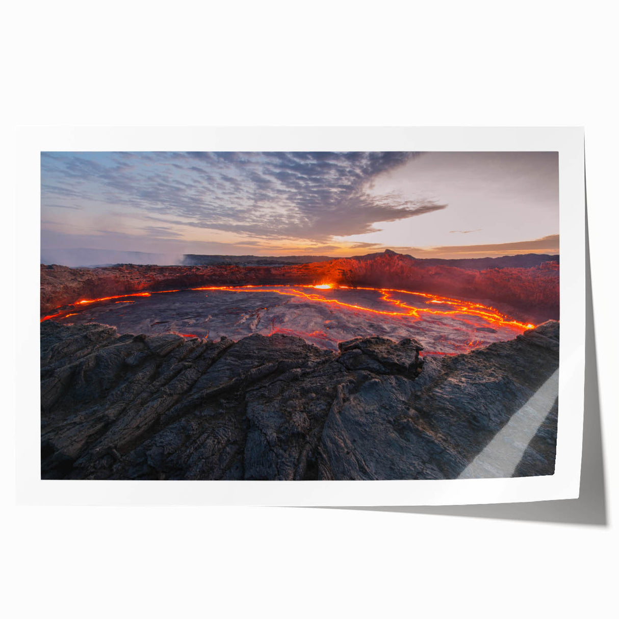 Rolled print showcasing a vibrant abstract volcano landscape design, featuring bold colors of red, orange, and yellow, designed for home decor or art collection.