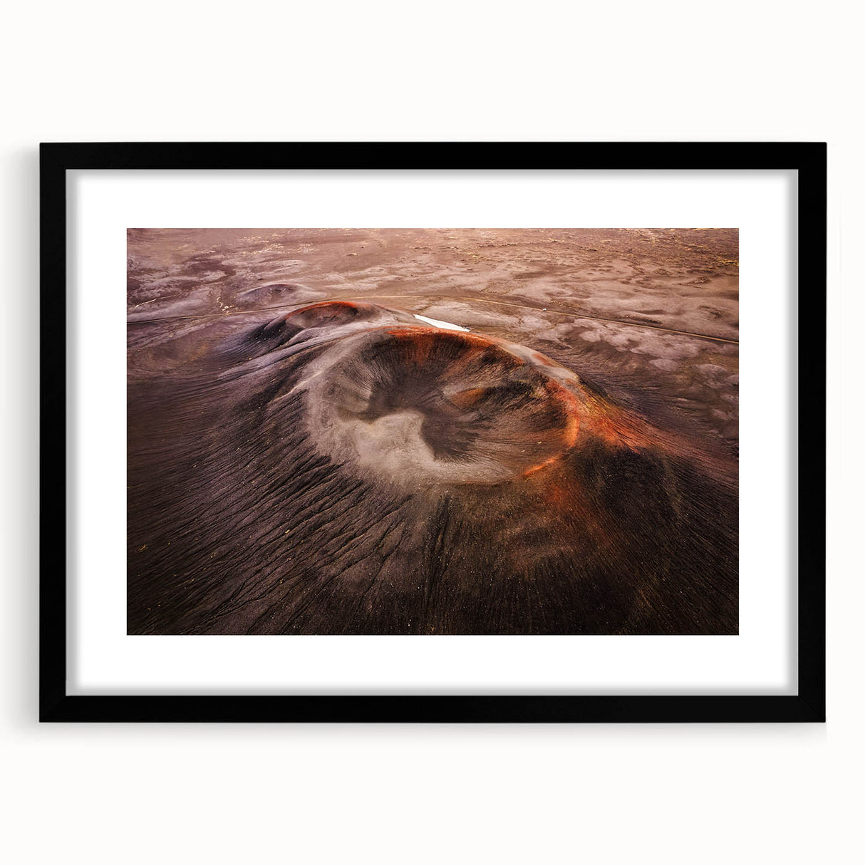 Black-framed wall art featuring a stunning volcano landscape design, showcasing vibrant colors and intricate details, ideal for home décor and art enthusiasts.