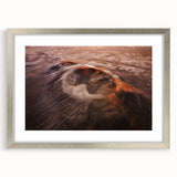 Framed landscape wall art featuring a vibrant volcanic scene, highlighted in a sleek silver frame with a mat. Ideal for modern home decor and art enthusiasts.