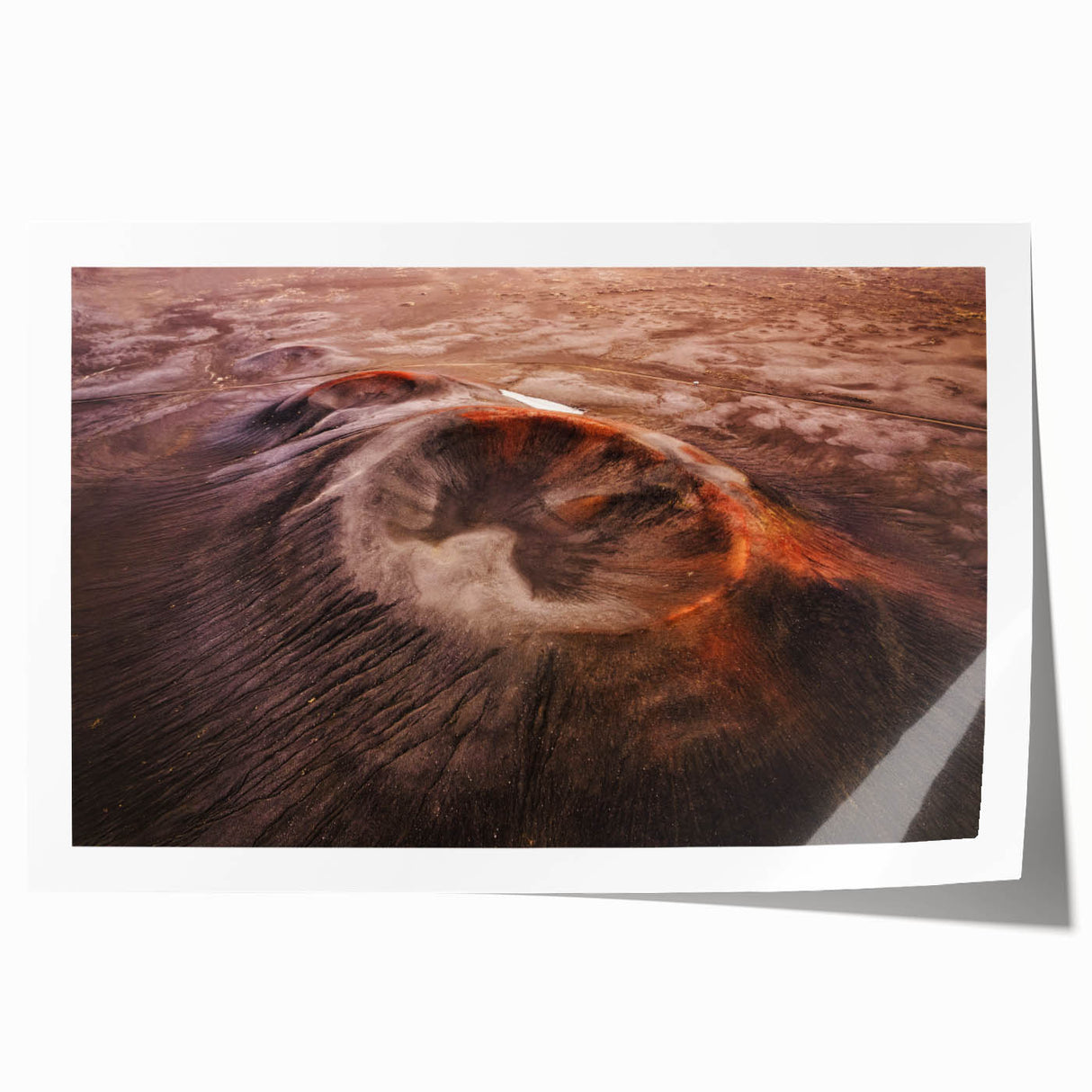 Vibrant rolled print featuring a stunning volcano landscape design, showcasing rich colors and dramatic textures, ideal for home décor or art enthusiasts.