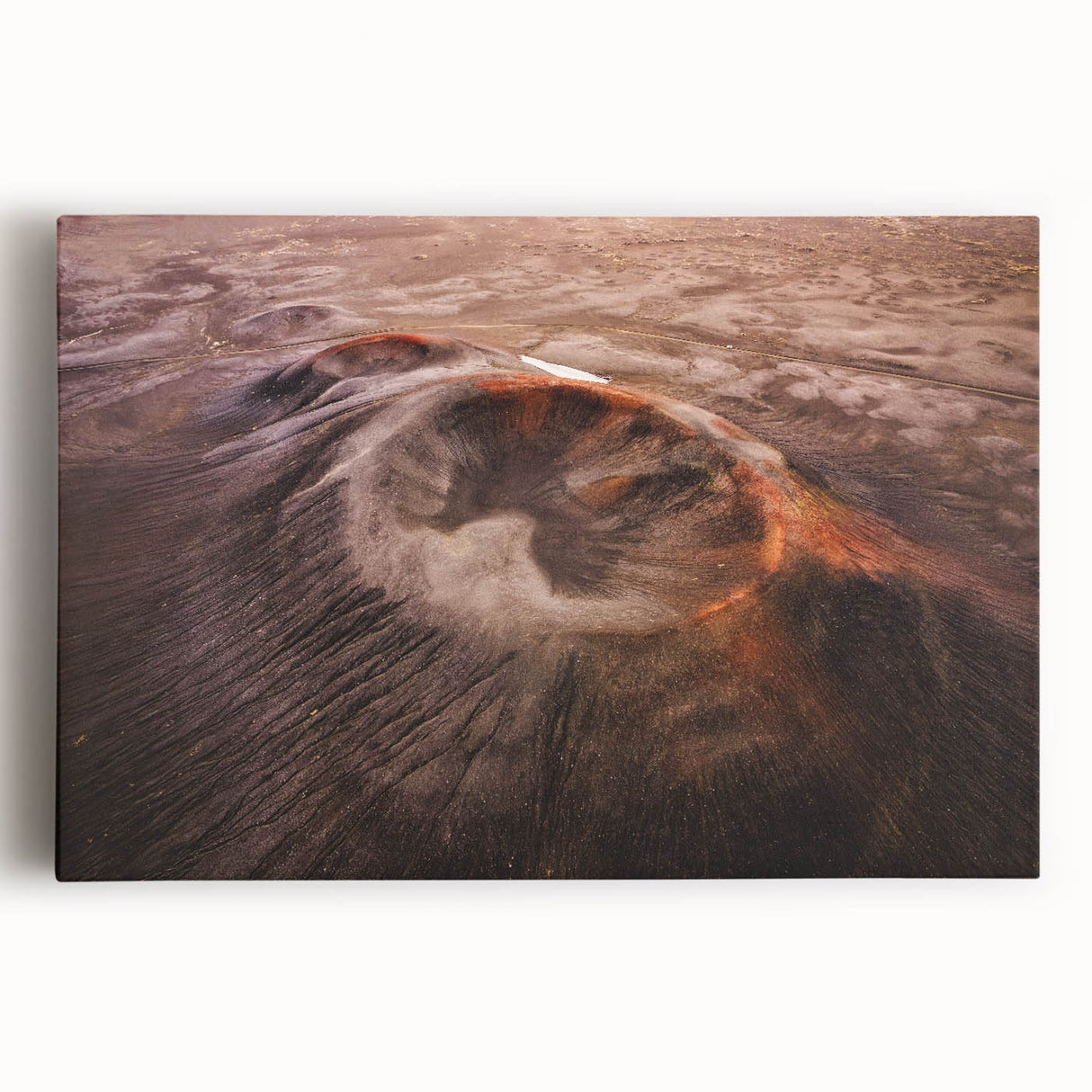 Stretched canvas wall art featuring a vibrant volcano landscape design, showcasing vivid colors and dynamic textures, perfect for home decor or office spaces.