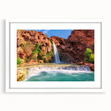 Framed wall art featuring a serene landscape of cascading waterfalls, set in a white mat and frame, perfect for enhancing home decor with nature-inspired elegance.