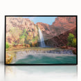 Framed acrylic wall art featuring a stunning landscape design of waterfalls, presented in a sleek black frame, perfect for enhancing home decor with natural beauty.