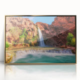 Framed acrylic wall art featuring a serene waterfall landscape with vibrant colors, highlighted by a gold border, perfect for home decor and relaxation.