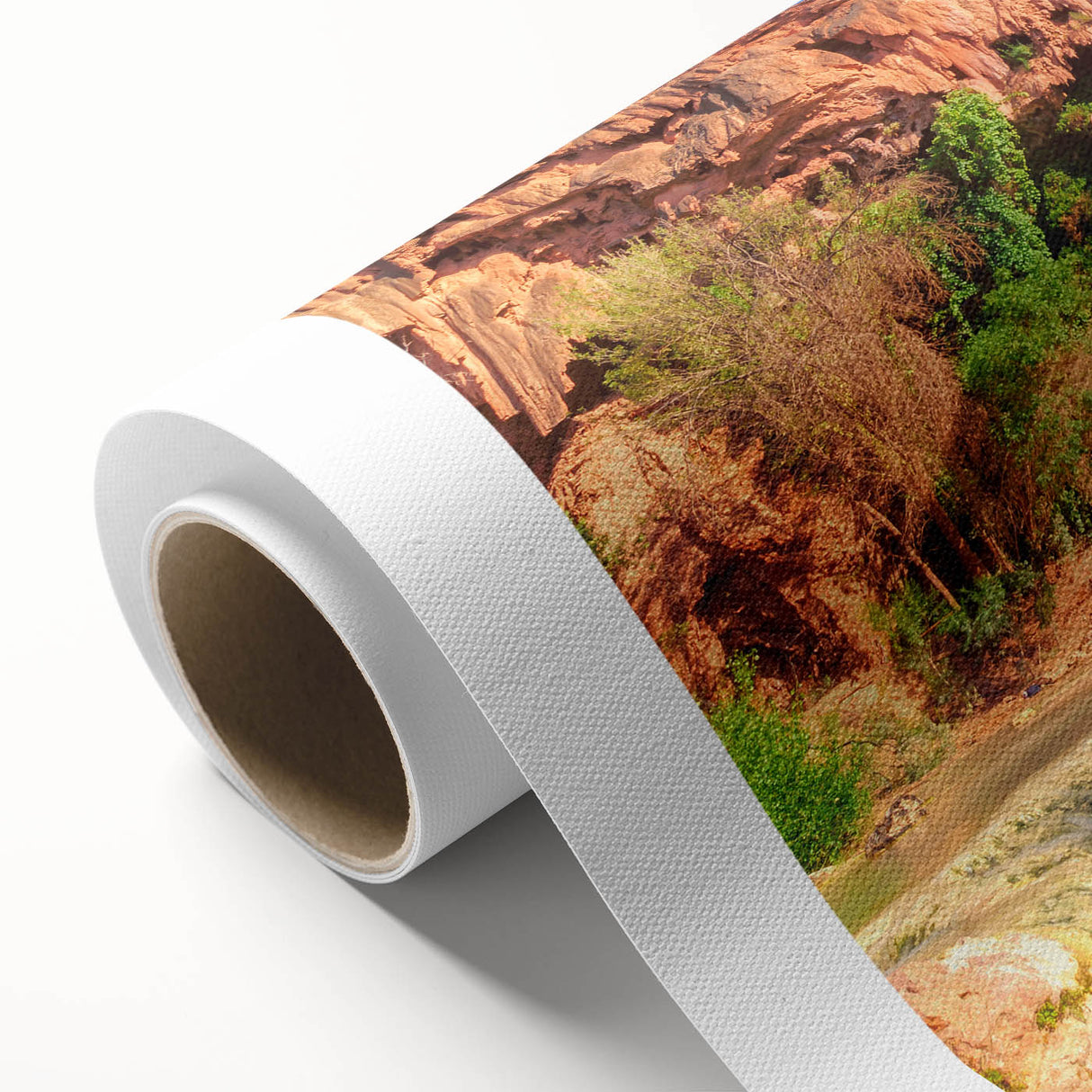 Serene landscape wall art featuring a picturesque waterfall cascading over rocks, surrounded by lush greenery on a rolled canvas print, perfect for home decor.