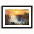 Framed wall art featuring a serene landscape with cascading waterfalls, set in a sleek black frame and matting, perfect for home decor that evokes tranquility.