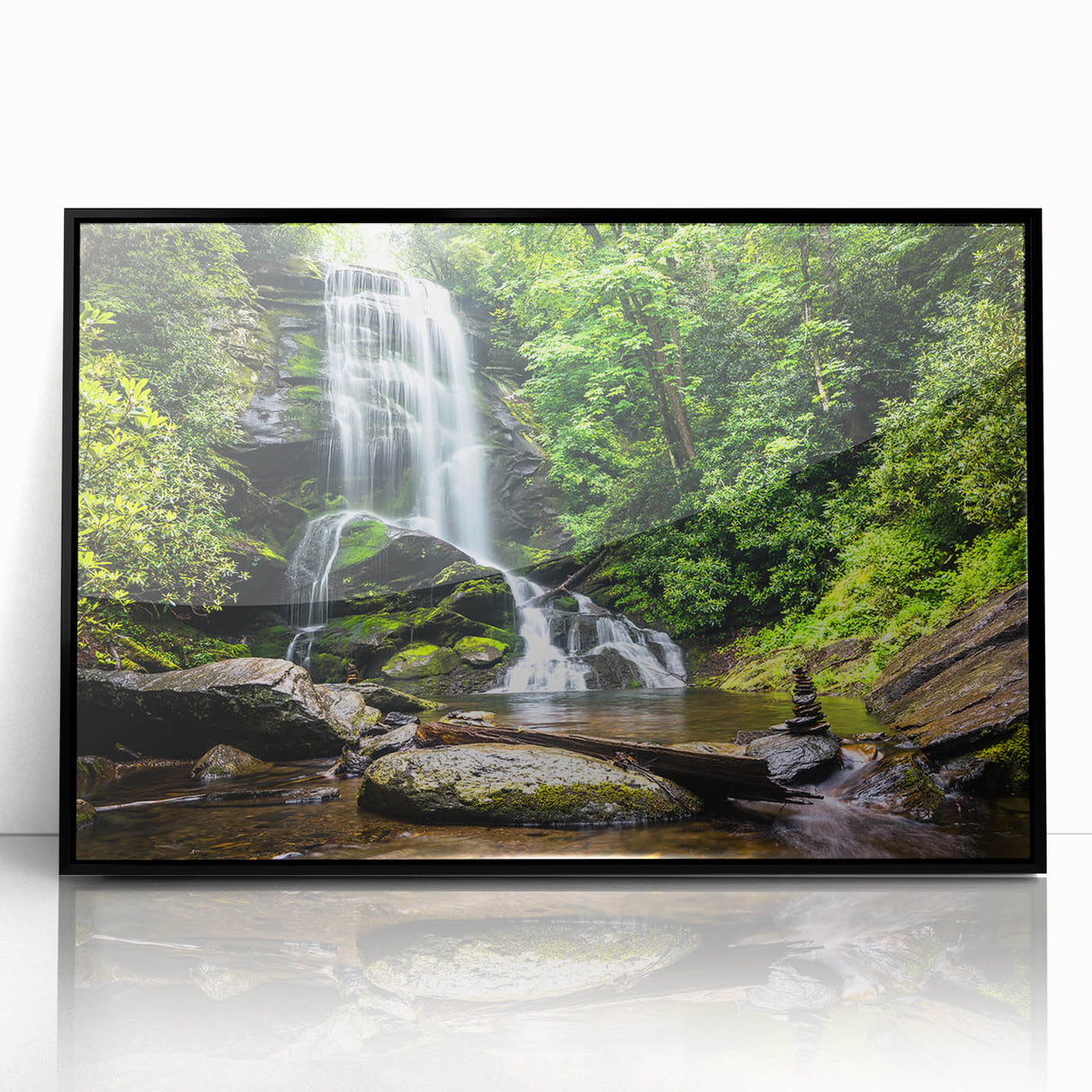 Framed wall art featuring a stunning waterfall landscape design with vibrant colors, set in a sleek black frame, ideal for enhancing home decor.