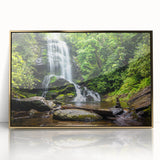 Framed acrylic wall art showcasing a stunning waterfall landscape with vibrant colors and a gold frame, ideal for enhancing home decor and creating a calming atmosphere.