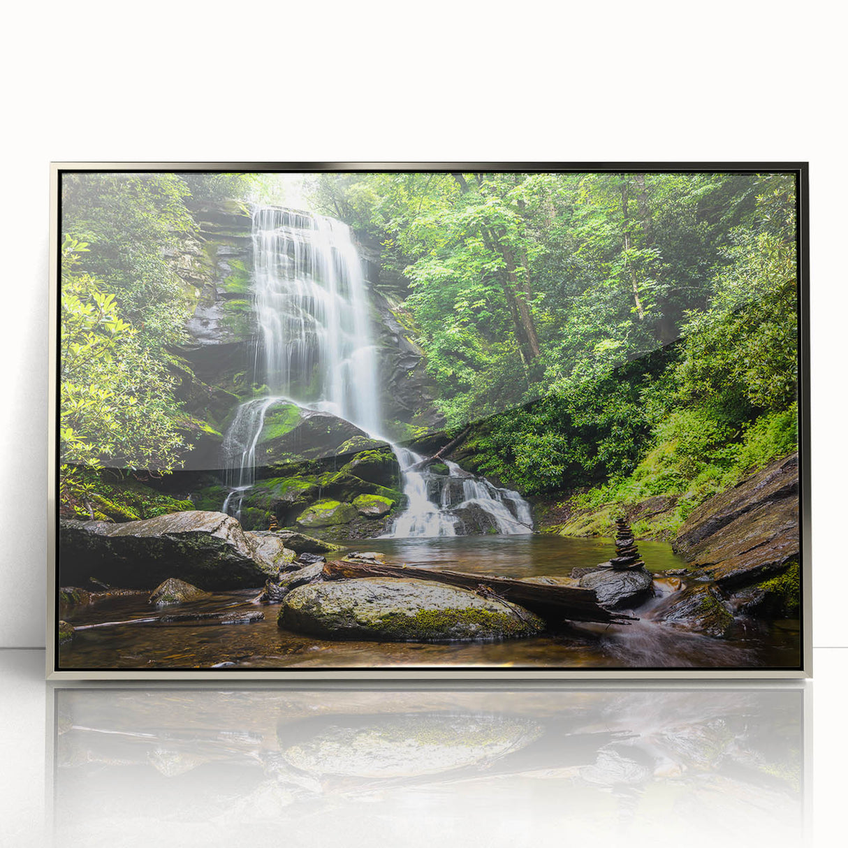Framed wall art featuring a stunning waterfall landscape design in vibrant colors, presented in a sleek silver frame, perfect for enhancing home decor aesthetics.