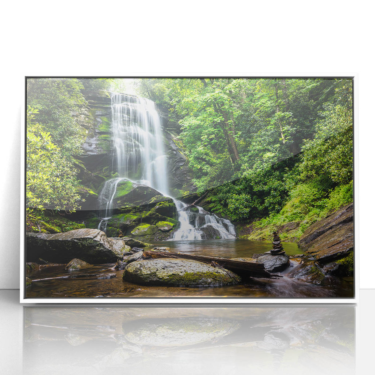 Framed acrylic wall art featuring a serene waterfall landscape design, highlighting vibrant colors and intricate details, perfect for home decor enhancement.